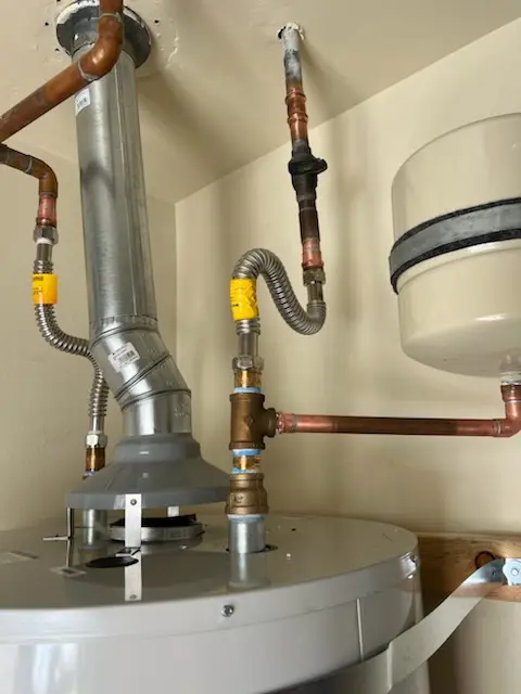 Water heater installation and plumbing repair in Midway City
